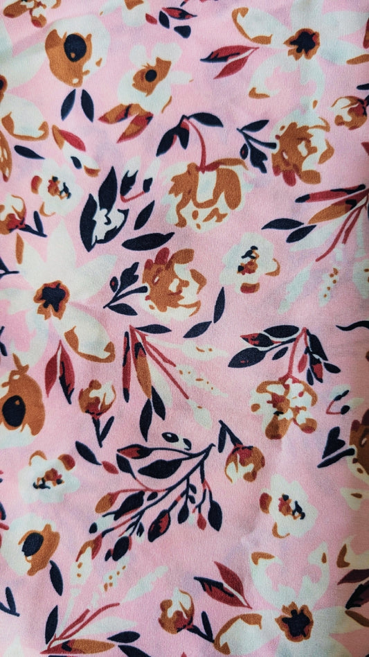 Floral pattern on pink fabric