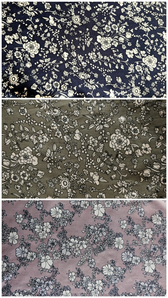 Three floral fabric in navy  Dusty green and mauve each featuring white botanical prints arranged vertically