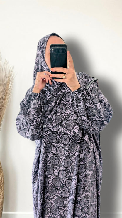 Purple Mandala print prayer abaya with matching hijab on plain studio background
